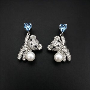 Wholesale Swarovski Bear Earrings featuring pink heart crystals on platinum plated brass from JuneJewelry.com.