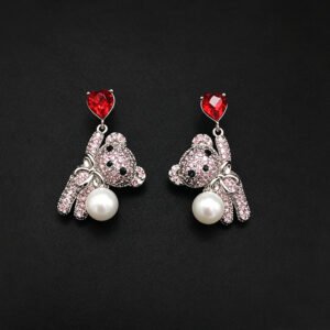 Wholesale Swarovski Bear Earrings featuring pink heart crystals on platinum plated brass from JuneJewelry.com.