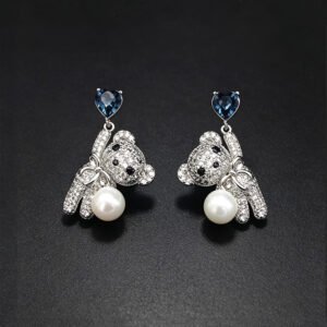 Wholesale Swarovski Bear Earrings featuring pink heart crystals on platinum plated brass from JuneJewelry.com.