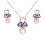 Wholesale Heart Jewelry Set featuring purple crystals and opal hearts on rose gold plated zinc alloy from JuneJewelry.com.