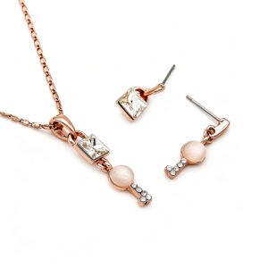 Wholesale Key Crystal Set featuring square crystals and cat eye stones on rose gold plated zinc alloy from JuneJewelry.com.