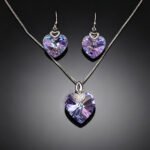 Wholesale geometric jewelry set made of white gold plated copper with purple and gold Swarovski element crystals from JuneJewelry.com.