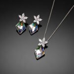 Wholesale crystal jewelry set made of white gold plated copper with floral details and geometric Swarovski element crystals from JuneJewelry.com.