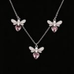 Wholesale bee jewelry set made of white gold plated copper with pink heart Swarovski element crystals from JuneJewelry.com.