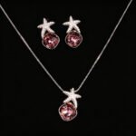 Wholesale starfish jewelry set crafted from white gold plated copper with blue Swarovski element crystals from JuneJewelry.com.