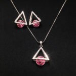 Wholesale geometric jewelry set featuring white gold plated copper with pink Swarovski element crystals from JuneJewelry.com.