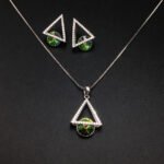 Wholesale geometric jewelry set featuring white gold plated copper with pink Swarovski element crystals from JuneJewelry.com.