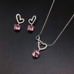 Wholesale heart jewelry set crafted from white gold plated copper with pink Swarovski element crystals from JuneJewelry.com.