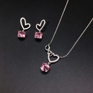 Wholesale heart jewelry set crafted from white gold plated copper with pink Swarovski element crystals from JuneJewelry.com.