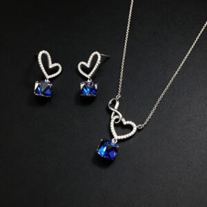 Wholesale heart jewelry set crafted from white gold plated copper with pink Swarovski element crystals from JuneJewelry.com.