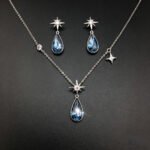 Wholesale star jewelry set made of white gold plated copper with clear Swarovski element teardrop crystals from JuneJewelry.com.