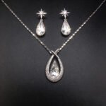 Wholesale teardrop jewelry set crafted from white gold plated copper with iridescent Aurora Borealis Swarovski element crystals from JuneJewelry.com.