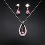 Wholesale teardrop jewelry set crafted from white gold plated copper with iridescent Aurora Borealis Swarovski element crystals from JuneJewelry.com.