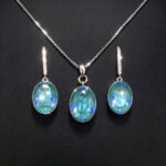 Wholesale oval jewelry set made of white gold plated copper with royal blue Swarovski element crystals from JuneJewelry.com.