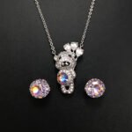 Wholesale teddy jewelry set featuring white gold plated copper with pink Swarovski element crystals from JuneJewelry.com.