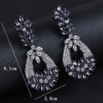 Wholesale crystal chandelier earrings made of platinum plated brass with shiny zircon stones for bulk buyers at JuneJewelry.com.