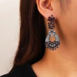 Wholesale crystal chandelier earrings made of platinum plated brass with shiny zircon stones for bulk buyers at JuneJewelry.com.