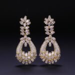 Wholesale crystal chandelier earrings made of platinum plated brass with shiny zircon stones for bulk buyers at JuneJewelry.com.
