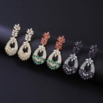 Wholesale crystal chandelier earrings made of platinum plated brass with shiny zircon stones for bulk buyers at JuneJewelry.com.