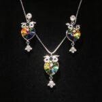 Wholesale owl jewelry set made of white gold plated copper with purple heart Swarovski element crystals from JuneJewelry.com.