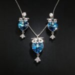 Wholesale owl jewelry set made of white gold plated copper with purple heart Swarovski element crystals from JuneJewelry.com.