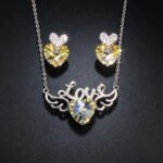 Wholesale leaf jewelry set made of white gold plated copper with purple Swarovski element crystals from JuneJewelry.com.
