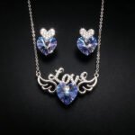 Wholesale leaf jewelry set made of white gold plated copper with purple Swarovski element crystals from JuneJewelry.com.