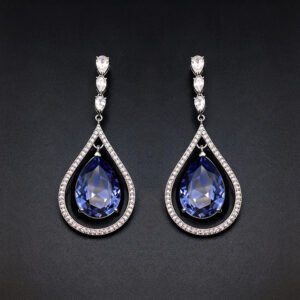 Wholesale waterdrop crystal earrings with blue Swarovski Element crystals in platinum plated brass from JuneJewelry.com – luxury dangle earrings for bulk orders.