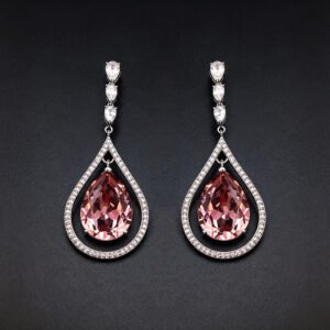 Wholesale waterdrop crystal earrings with blue Swarovski Element crystals in platinum plated brass from JuneJewelry.com – luxury dangle earrings for bulk orders.