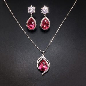 Wholesale crystal jewelry set featuring white gold plated copper with magenta pink teardrop Swarovski element crystals from JuneJewelry.com.