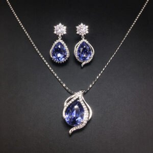 Wholesale crystal jewelry set featuring white gold plated copper with magenta pink teardrop Swarovski element crystals from JuneJewelry.com.