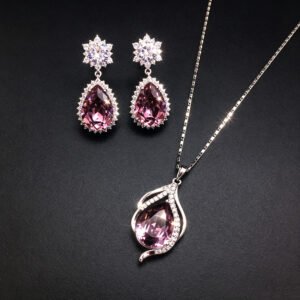 Wholesale crystal jewelry set featuring white gold plated copper with magenta pink teardrop Swarovski element crystals from JuneJewelry.com.