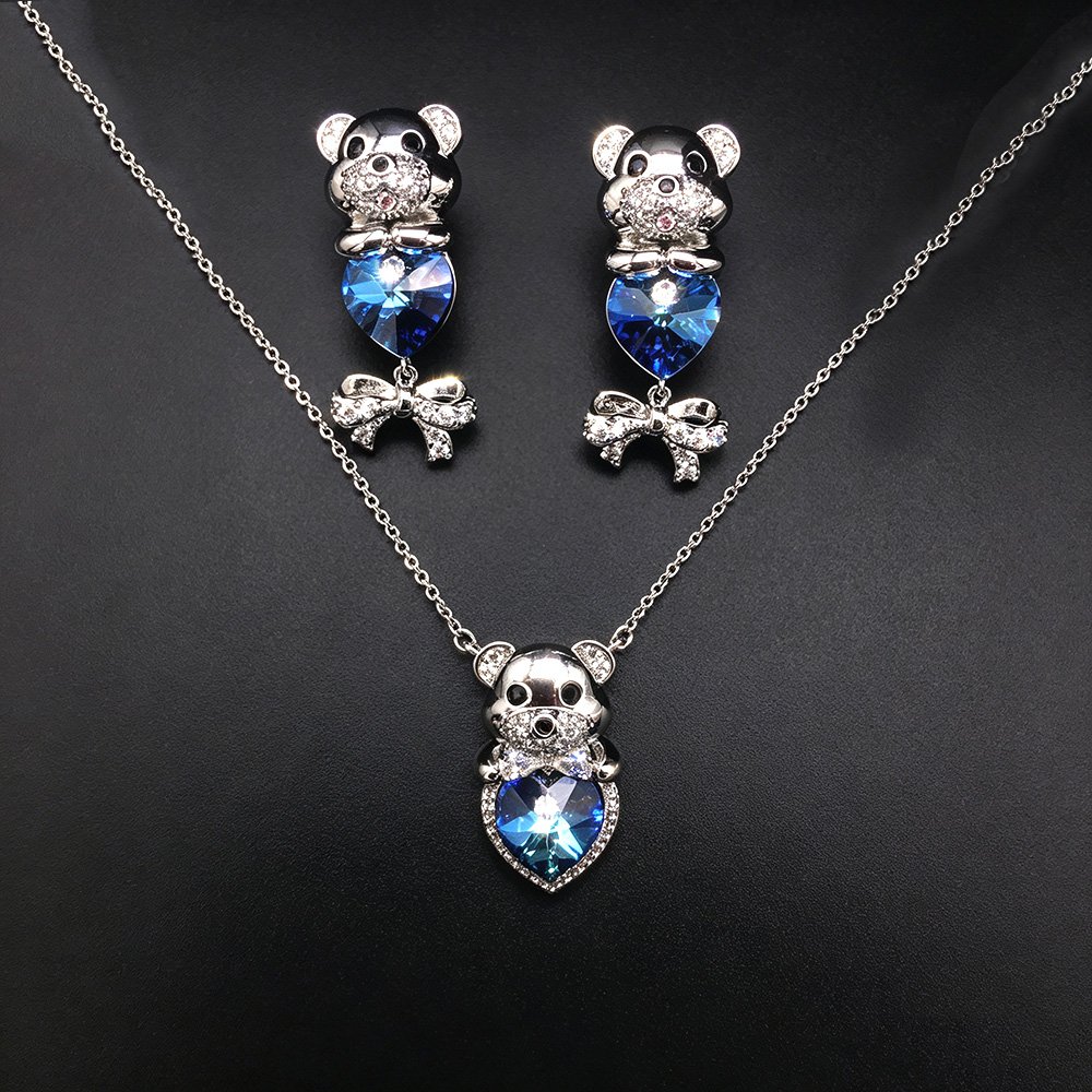 G300424-G100312E18Y.216.A Wholesale cute bear jewelry set made of white gold plated copper with purple heart Swarovski element crystals from JuneJewelry.com.