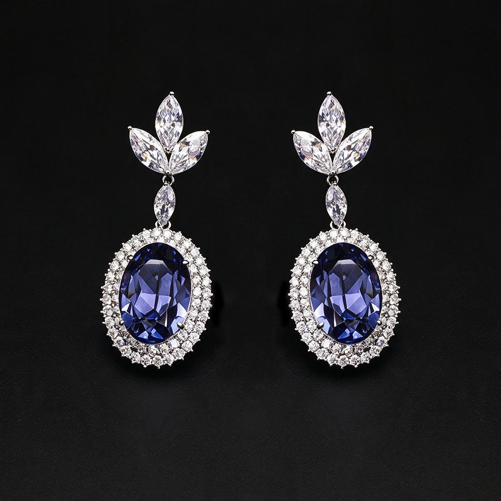 Wholesale blue crystal earrings featuring Swarovski Element crystals on platinum plated brass from JuneJewelry.com – high quality luxury dangle earrings for bulk orders.