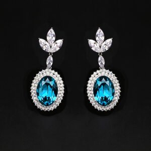 Wholesale blue crystal earrings featuring Swarovski Element crystals on platinum plated brass from JuneJewelry.com – high quality luxury dangle earrings for bulk orders.