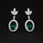 Wholesale blue crystal earrings featuring Swarovski Element crystals on platinum plated brass from JuneJewelry.com – high quality luxury dangle earrings for bulk orders.