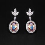 Wholesale blue crystal earrings featuring Swarovski Element crystals on platinum plated brass from JuneJewelry.com – high quality luxury dangle earrings for bulk orders.