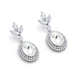 Wholesale blue crystal earrings featuring Swarovski Element crystals on platinum plated brass from JuneJewelry.com – high quality luxury dangle earrings for bulk orders.