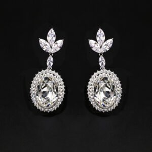 Wholesale blue crystal earrings featuring Swarovski Element crystals on platinum plated brass from JuneJewelry.com – high quality luxury dangle earrings for bulk orders.