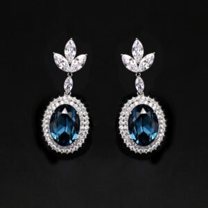 Wholesale blue crystal earrings featuring Swarovski Element crystals on platinum plated brass from JuneJewelry.com – high quality luxury dangle earrings for bulk orders.