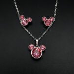 Wholesale Mickey jewelry set featuring white gold plated copper with pink Swarovski element crystals from JuneJewelry.com.