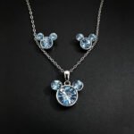Wholesale Mickey jewelry set featuring white gold plated copper with pink Swarovski element crystals from JuneJewelry.com.