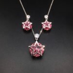 Wholesale star jewelry set featuring white gold plated copper with pink Swarovski element crystals from JuneJewelry.com.