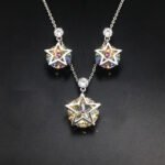 Wholesale star jewelry set featuring white gold plated copper with pink Swarovski element crystals from JuneJewelry.com.