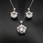Wholesale star jewelry set featuring white gold plated copper with pink Swarovski element crystals from JuneJewelry.com.