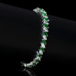 Wholesale Ruby Zircon Bracelet featuring red and clear marquise stones on platinum plated copper from JuneJewelry.com