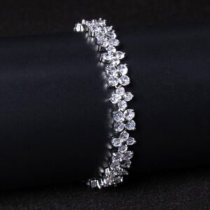 Wholesale Floral Zircon Bracelet featuring four-petal flower CZ stones on platinum plated copper from JuneJewelry.com