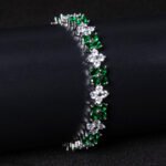 Wholesale Floral Zircon Bracelet featuring four-petal flower CZ stones on platinum plated copper from JuneJewelry.com