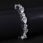 Wholesale Luxury Zircon Bracelet with alternating pear and round CZ stones on platinum plated copper from JuneJewelry.com