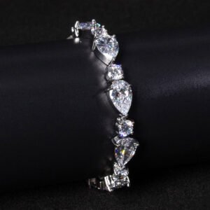 Wholesale Luxury Zircon Bracelet with alternating pear and round CZ stones on platinum plated copper from JuneJewelry.com